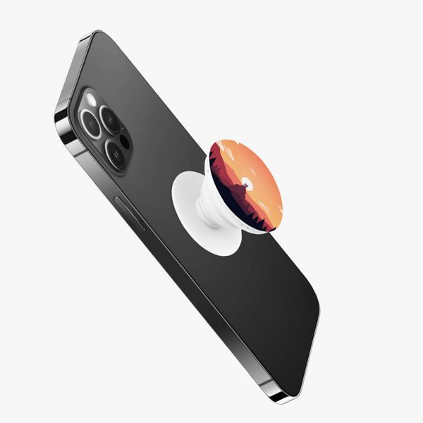 The phone holder with the sunset picture is glued to the back of the iPhone