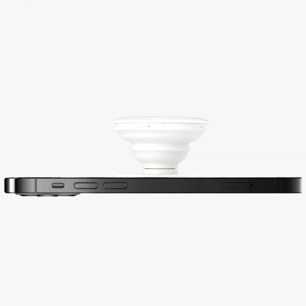 A white phone holder is glued to the back of an iPhone