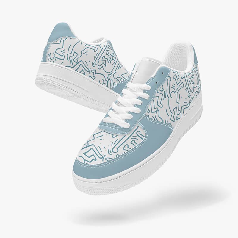 Low Top Sneaker A pair of blue graffiti low-top shoes