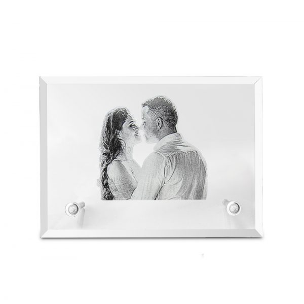 A photo of a couple is customised in a crystal photo frame