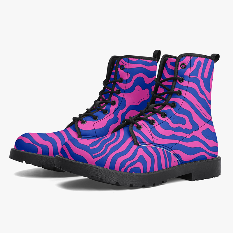 Boots with abstract designs A pair of purple boots with an abstract pattern