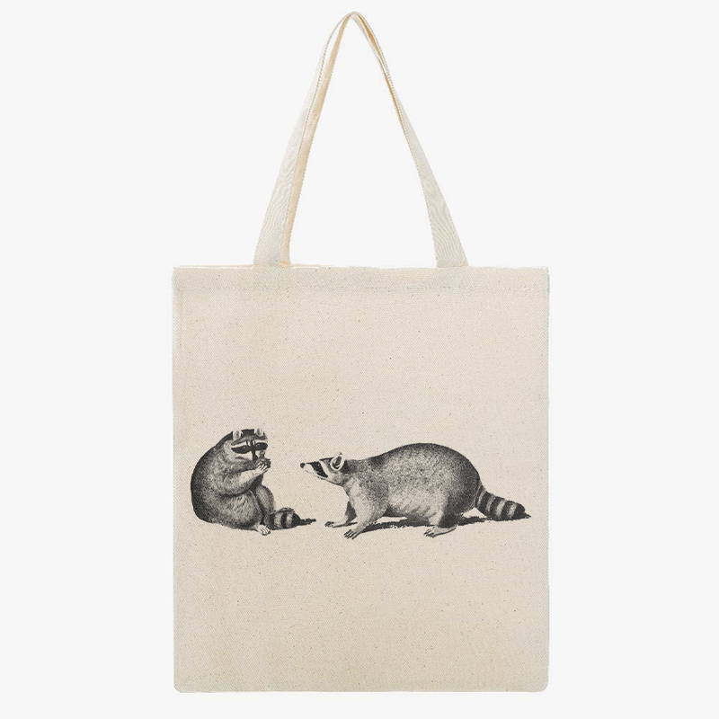 Canvas tote bag A canvas tote bag with two raccoons