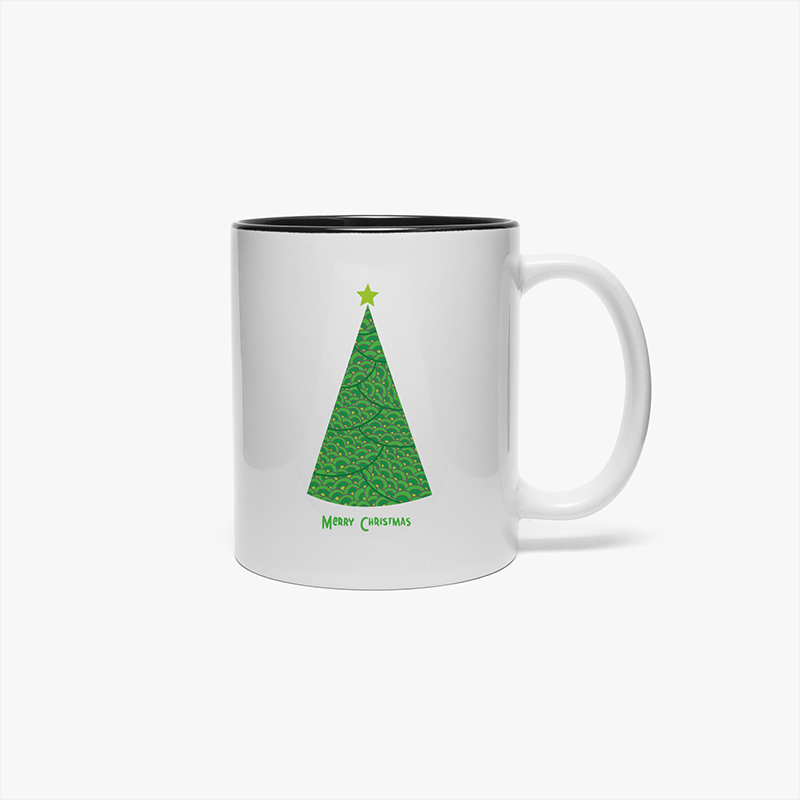 Christmas Mugs A mug with a Christmas tree design