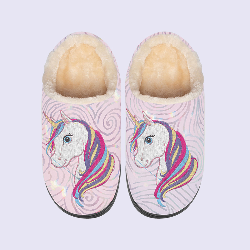 Custom embroidered slippers A pair of embroidered unicorn slippers