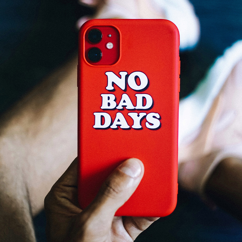 Make your own custom phone cases A person is holding a red mobile phone case