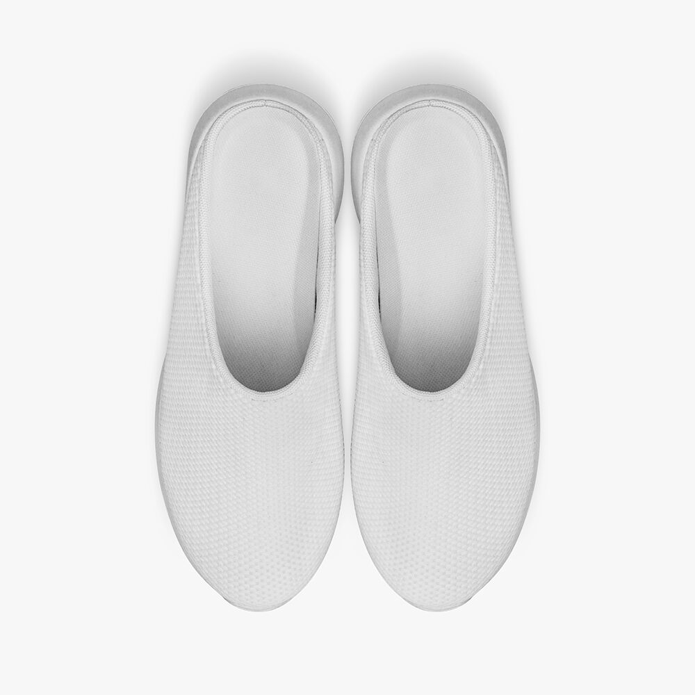 A pair of flip-flops printed with a beach scene