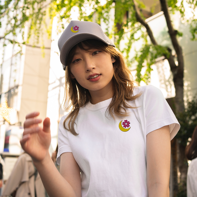 Use embroidery on a variety of products A girl wearing embroidered clothes