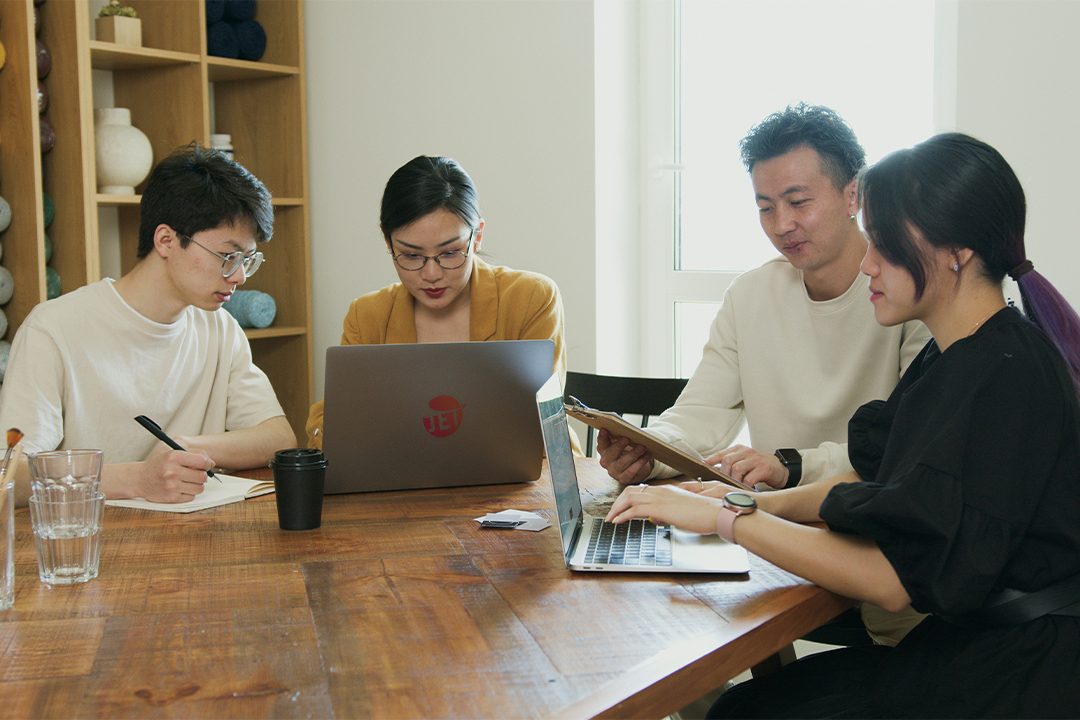 Your product and brand can begin here A group of people gathered together to discuss issues